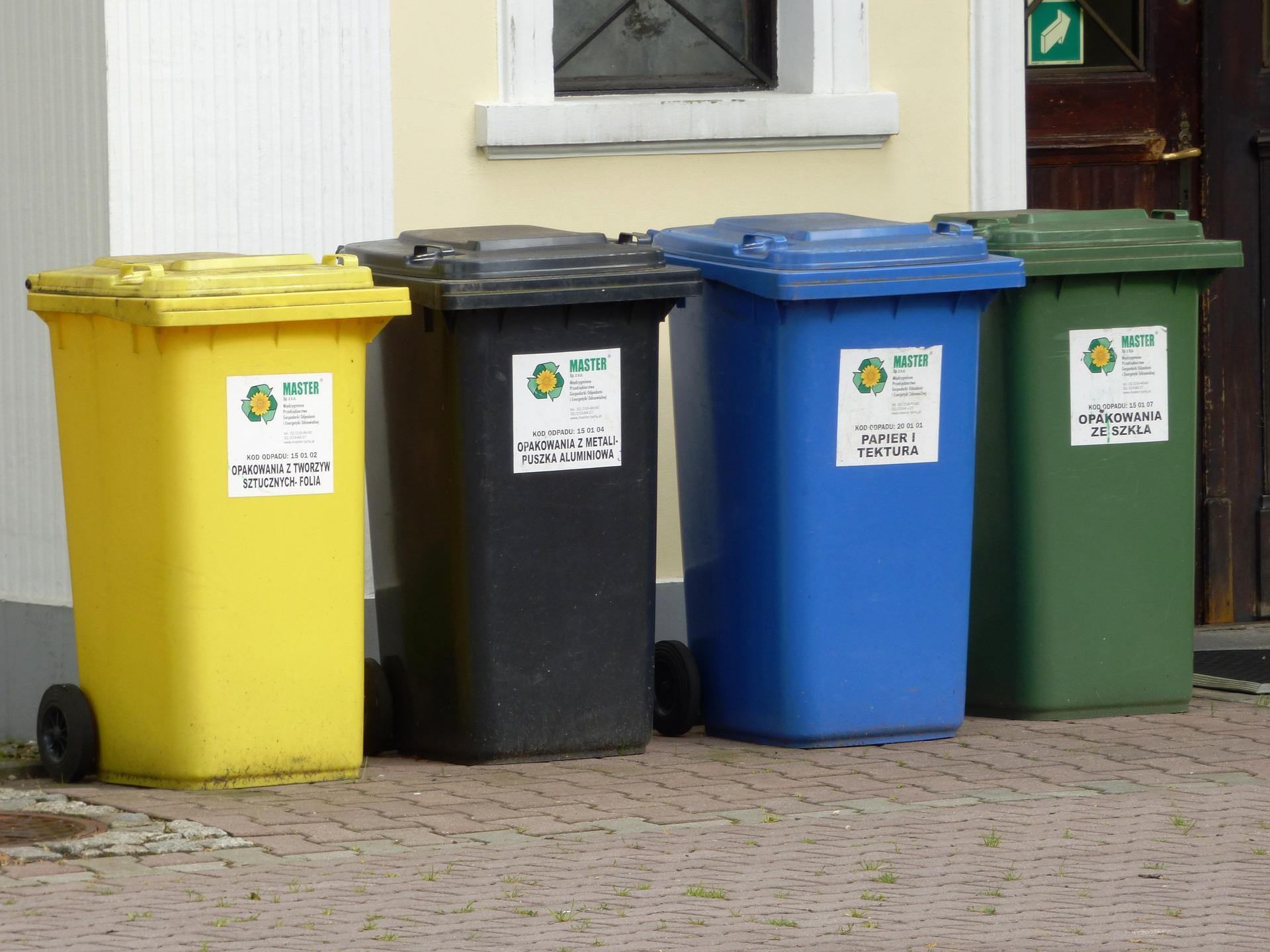 4 trash cans before getting treated with granular deodorant